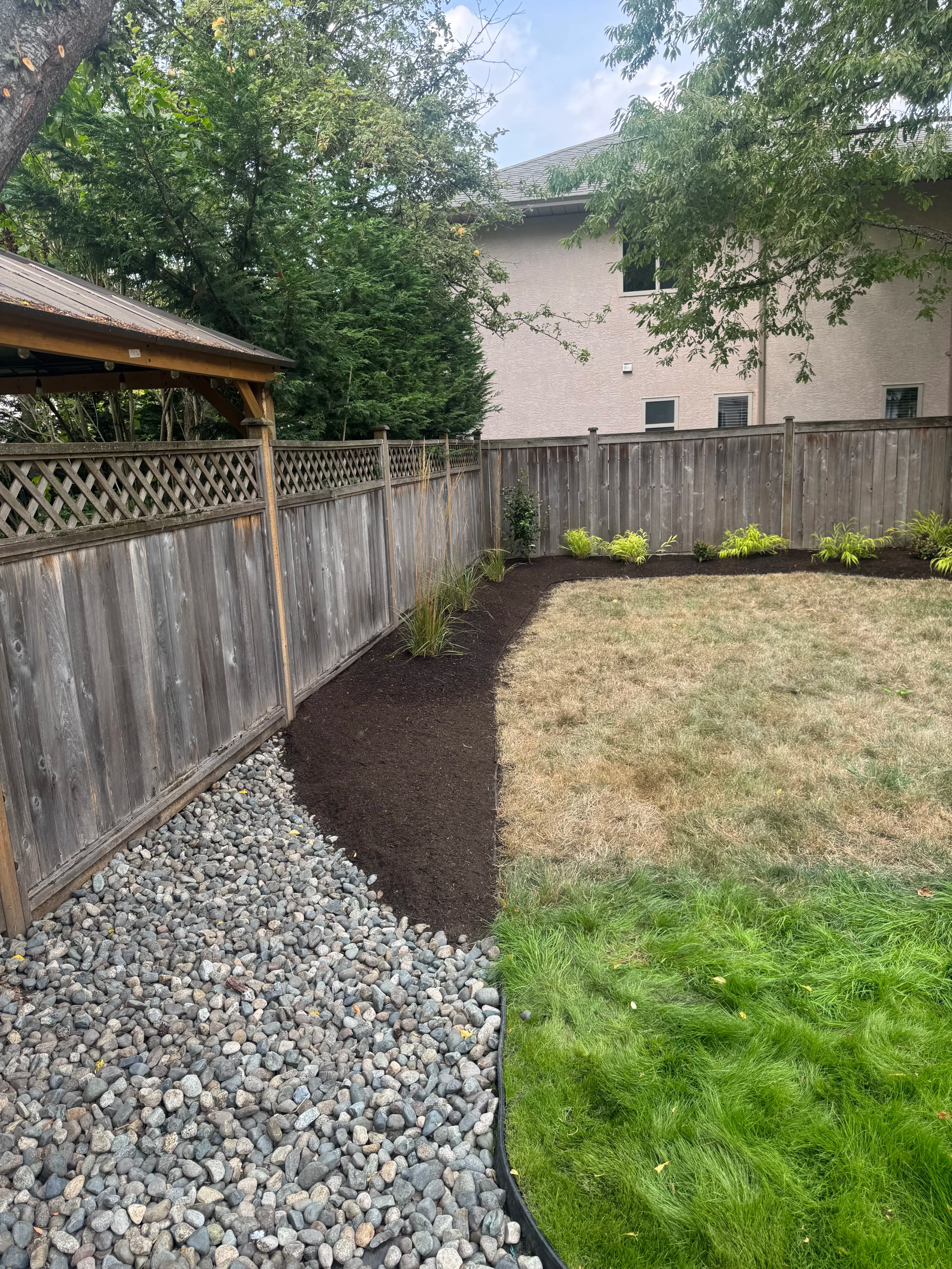 Project Turning a Hard-to-Manage Fence Line Into a Low-Maintenance Garden image
