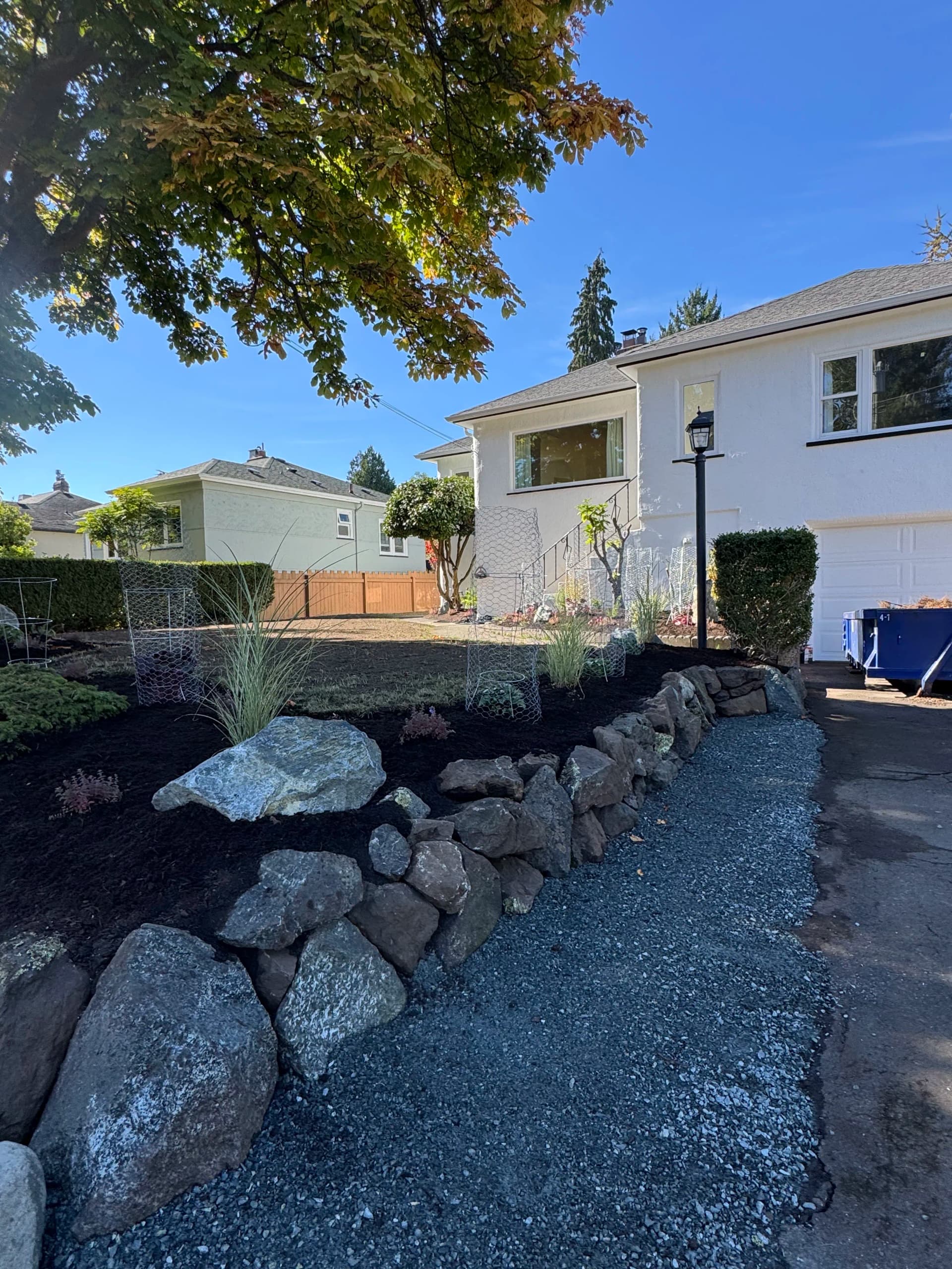 Rock Wall Rebuild That Opened Up the Driveway in Victoria