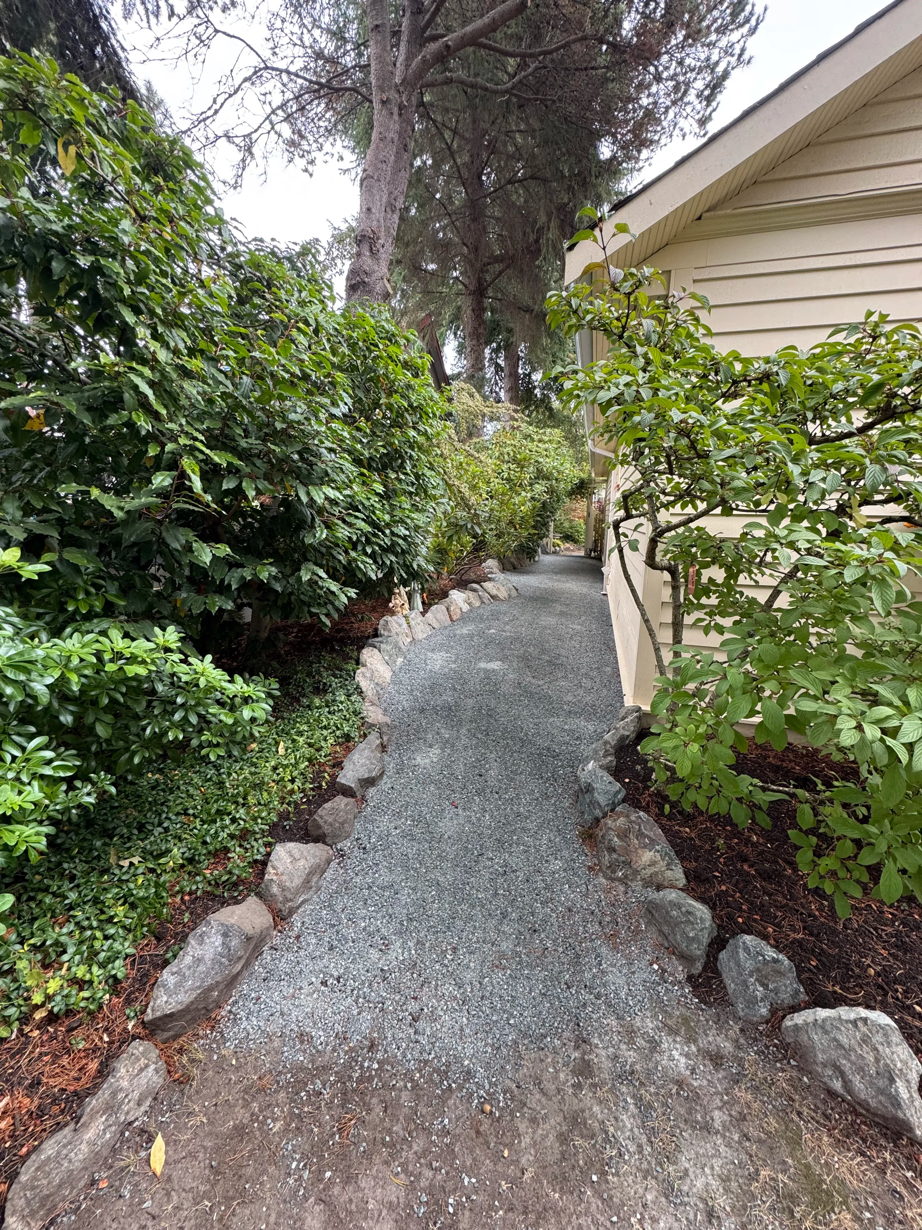 Project Gravel Pathway and Rock Wall Still Holding Strong image