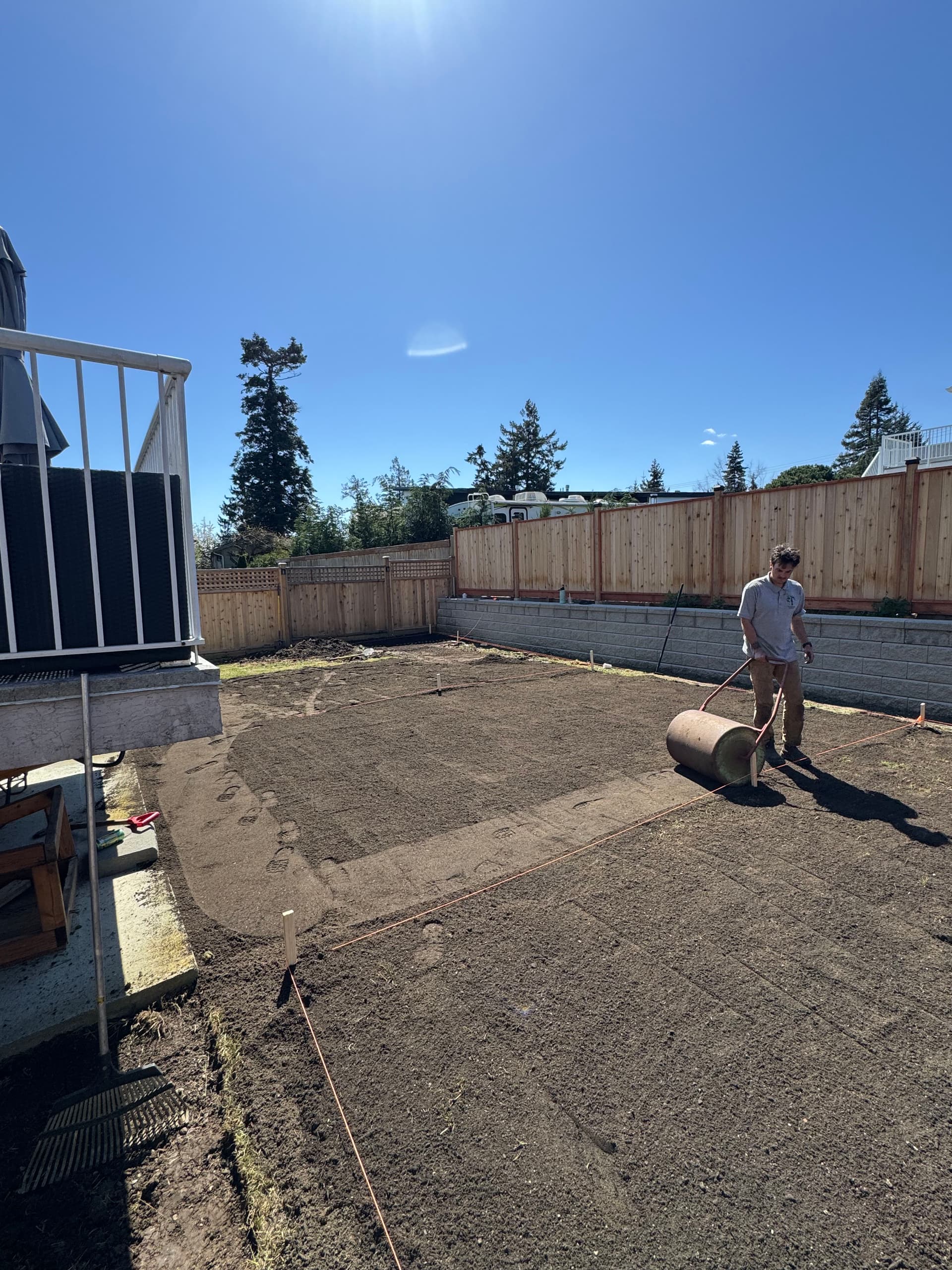 Gallery photos for Bare Dirt Backyard Gets a Full Soil and Sod Overhaul: Image #2