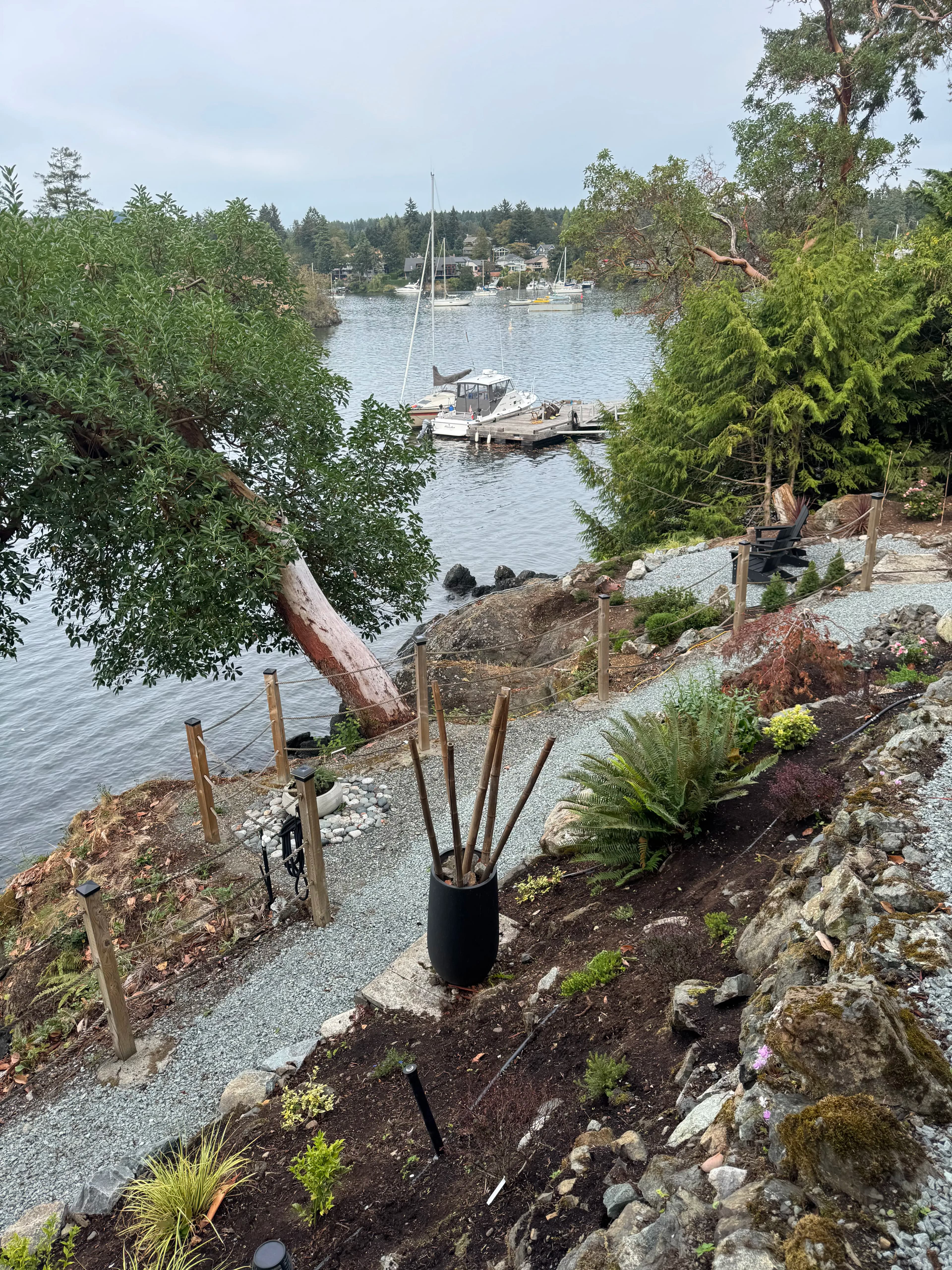 Project Waterfront Landscape Installation with Natural Garden Beds and Gravel Pathways image