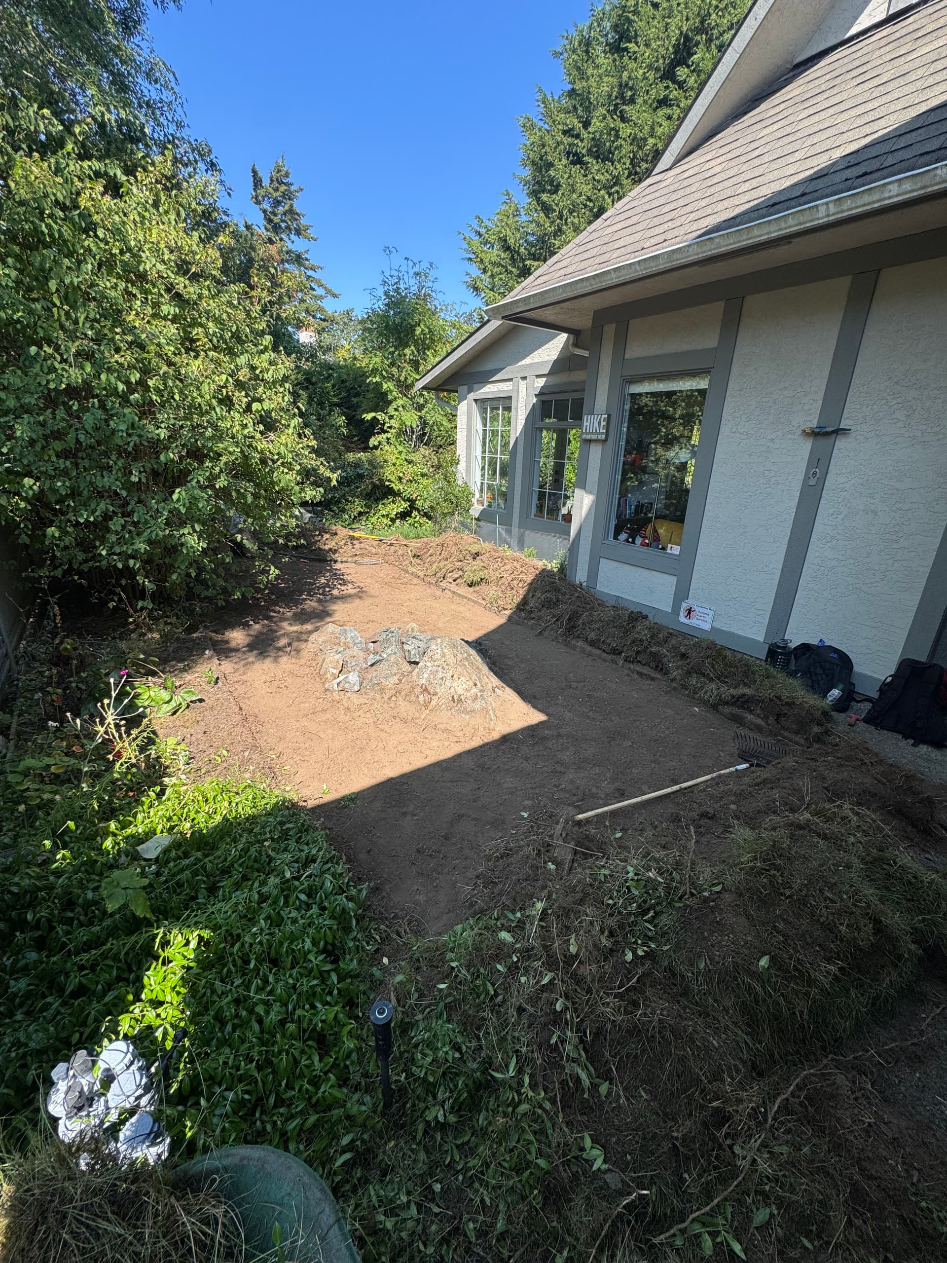 Gallery photos for Garden Bed Replaced With a Clean River Rock Feature: Image #3